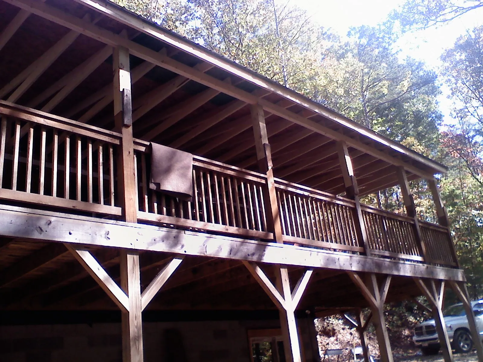 Timber framing under a new elevated porch and deck — Roof Leak Repair in Middleville by Roofing Brothers